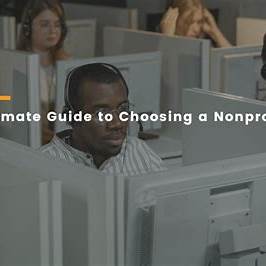 Individuals reviewing information at computer workstations